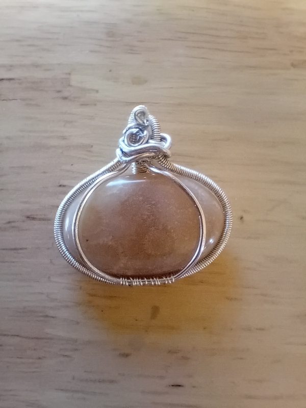 20260522_101521 Talisman "Veille de Lune" , pierre de lune pêche